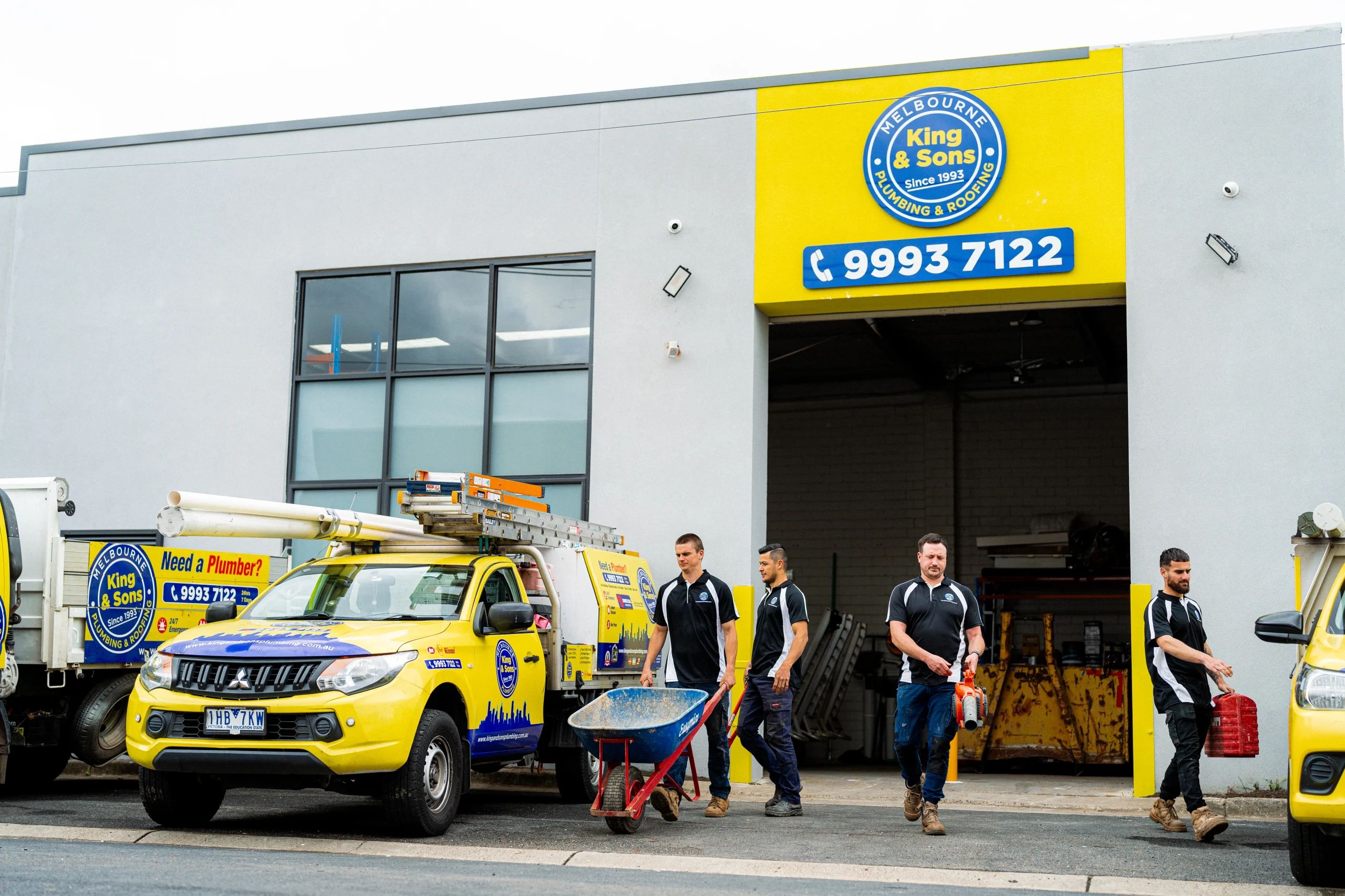 King and Sons Plumbing team and service vehicles outside the Melbourne depot, ready for maintenance jobs